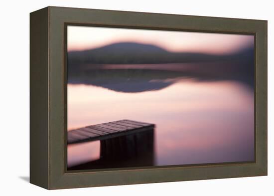 Usa, New Hampshire, Lyme. Dock and reflection of mountain in Hinman Pond at sunset.-Merrill Images-Framed Premier Image Canvas