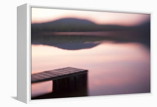 Usa, New Hampshire, Lyme. Dock and reflection of mountain in Hinman Pond at sunset.-Merrill Images-Framed Premier Image Canvas