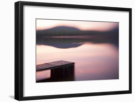 Usa, New Hampshire, Lyme. Dock and reflection of mountain in Hinman Pond at sunset.-Merrill Images-Framed Photographic Print