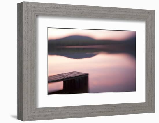 Usa, New Hampshire, Lyme. Dock and reflection of mountain in Hinman Pond at sunset.-Merrill Images-Framed Photographic Print