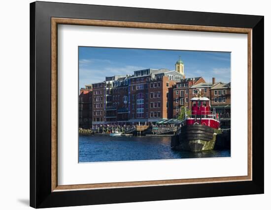 USA, New Hampshire, Portsmouth, waterfront buildings with tugboat-Walter Bibikow-Framed Photographic Print