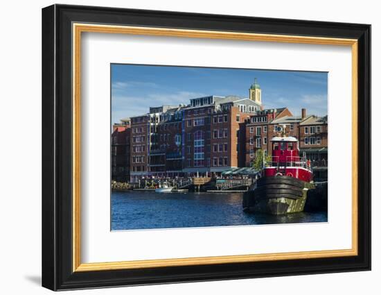 USA, New Hampshire, Portsmouth, waterfront buildings with tugboat-Walter Bibikow-Framed Photographic Print