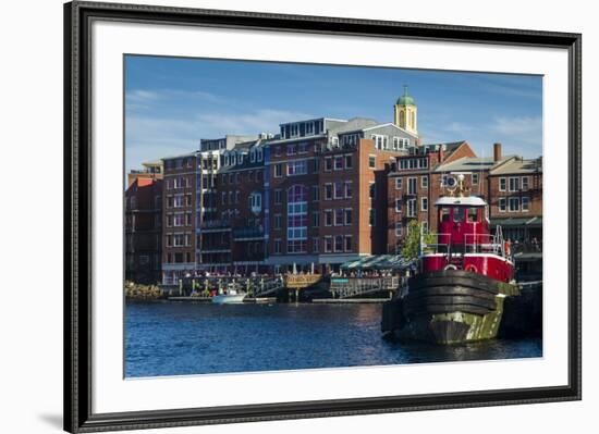 USA, New Hampshire, Portsmouth, waterfront buildings with tugboat-Walter Bibikow-Framed Premium Photographic Print