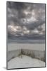 USA, New Jersey, Cape May National Seashore. Beach fence and stormy sunrise.-Jaynes Gallery-Mounted Photographic Print