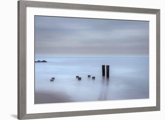 USA, New Jersey, Cape May National Seashore. Beach pilings on stormy sunrise.-Jaynes Gallery-Framed Premium Photographic Print