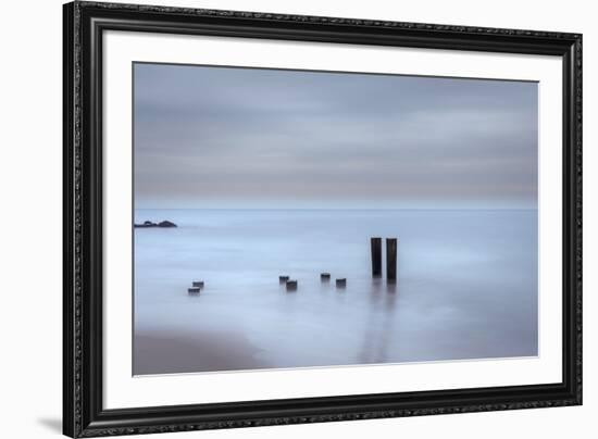 USA, New Jersey, Cape May National Seashore. Beach pilings on stormy sunrise.-Jaynes Gallery-Framed Premium Photographic Print