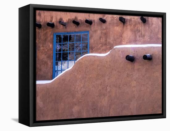 USA, New Mexico, Sant Fe, Adobe structure with protruding vigas and Snow-Terry Eggers-Framed Premier Image Canvas