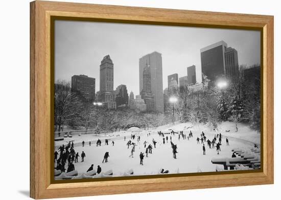 USA, New York, New York City, Skaters at the Wollman Rink-Walter Bibikow-Framed Premier Image Canvas