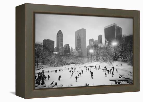 USA, New York, New York City, Skaters at the Wollman Rink-Walter Bibikow-Framed Premier Image Canvas