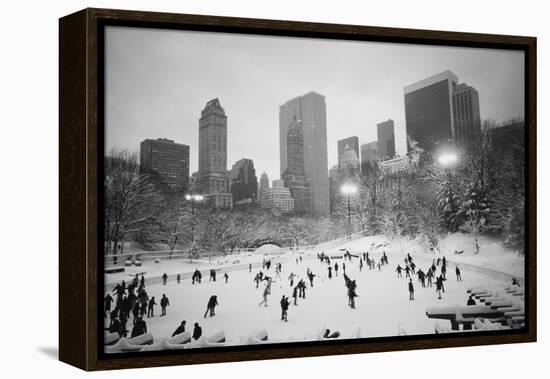 USA, New York, New York City, Skaters at the Wollman Rink-Walter Bibikow-Framed Premier Image Canvas