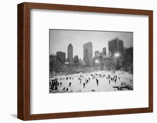 USA, New York, New York City, Skaters at the Wollman Rink-Walter Bibikow-Framed Photographic Print