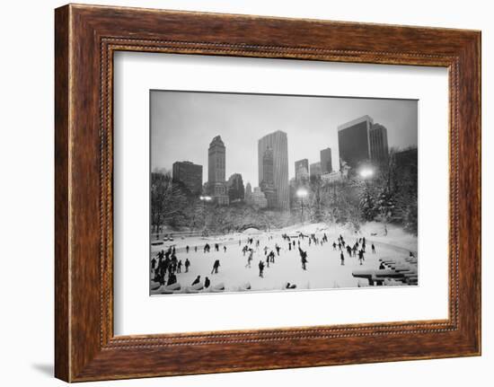 USA, New York, New York City, Skaters at the Wollman Rink-Walter Bibikow-Framed Photographic Print