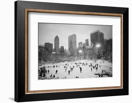 USA, New York, New York City, Skaters at the Wollman Rink-Walter Bibikow-Framed Photographic Print