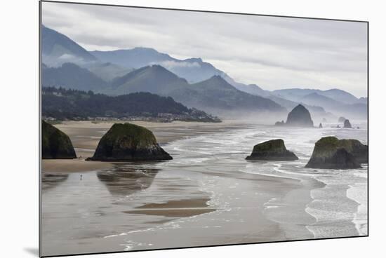 USA Oregon, Cannon Beach. Fog Rises over Coastline at Low Tide-Jean Carter-Mounted Photographic Print