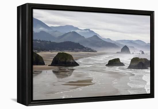 USA Oregon, Cannon Beach. Fog Rises over Coastline at Low Tide-Jean Carter-Framed Premier Image Canvas