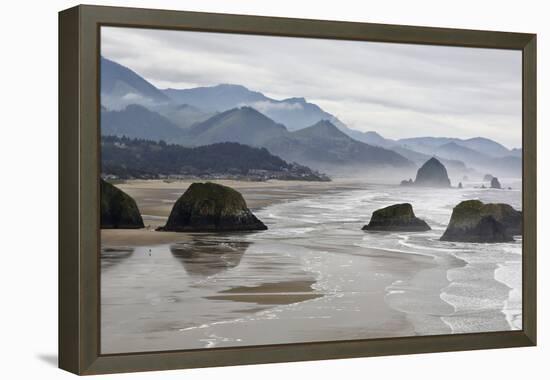 USA Oregon, Cannon Beach. Fog Rises over Coastline at Low Tide-Jean Carter-Framed Premier Image Canvas