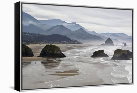 USA Oregon, Cannon Beach. Fog Rises over Coastline at Low Tide-Jean Carter-Framed Premier Image Canvas