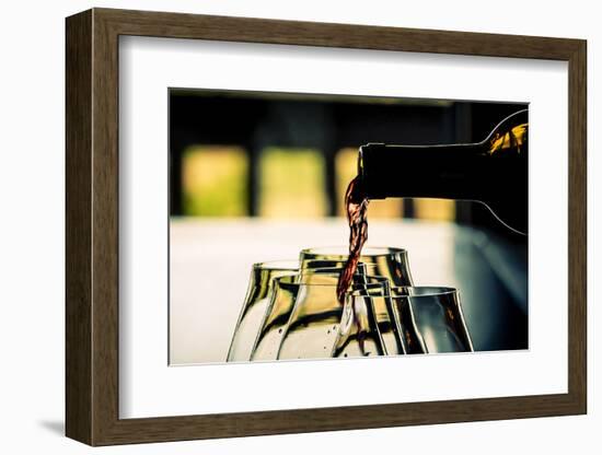 USA, Oregon, Willamette Valley Dramatic pour of pinot noir in an Oregon winery.-Richard Duval-Framed Photographic Print