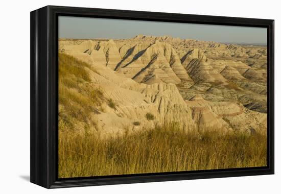 USA, South Dakota, Badlands NP. Grass and Eroded Formations-Cathy & Gordon Illg-Framed Premier Image Canvas