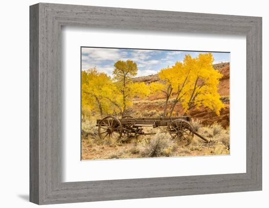 USA, Utah, Capitol Reef National Park. Old wagon and mountain and trees in autumn.-Jaynes Gallery-Framed Photographic Print