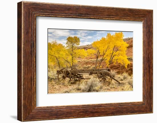 USA, Utah, Capitol Reef National Park. Old wagon and mountain and trees in autumn.-Jaynes Gallery-Framed Photographic Print