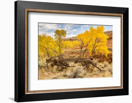 USA, Utah, Capitol Reef National Park. Old wagon and mountain and trees in autumn.-Jaynes Gallery-Framed Photographic Print