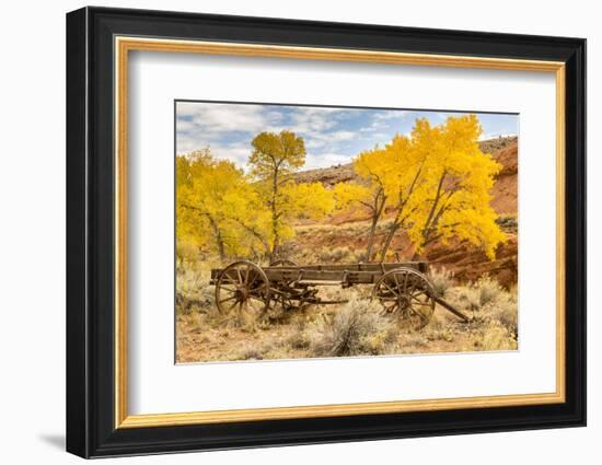 USA, Utah, Capitol Reef National Park. Old wagon and mountain and trees in autumn.-Jaynes Gallery-Framed Photographic Print