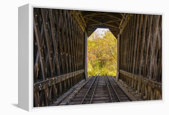 USA, Vermont, Fall foliage seen off Rt. 15, Wolcott, Fisher Covered Railroad Bridge (1908)-Alison Jones-Framed Premier Image Canvas