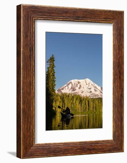 USA, WA. Woman kayaker paddles on calm, scenic Takhlakh Lake with Mt. Adams in the background.-Gary Luhm-Framed Photographic Print