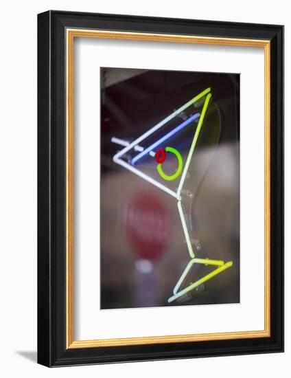 USA, Washington State, Seattle. A neon sign at a bar in the shape of a martini.-Merrill Images-Framed Photographic Print