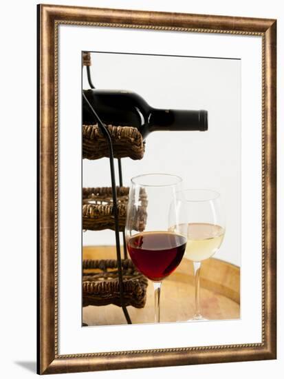 USA, Washington State, Seattle. Glass of red and white wine on a barrel.-Richard Duval-Framed Photographic Print