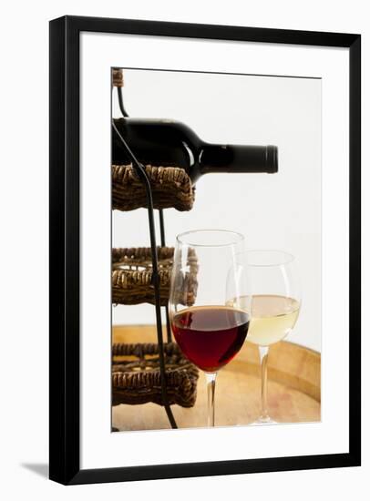 USA, Washington State, Seattle. Glass of red and white wine on a barrel.-Richard Duval-Framed Photographic Print