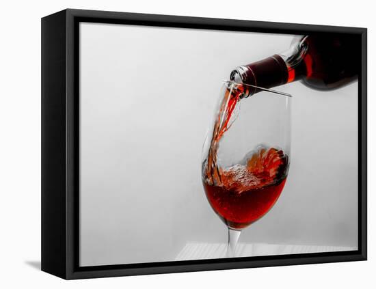 USA, Washington State, Seattle. Red wine pours into a glass.-Richard Duval-Framed Premier Image Canvas
