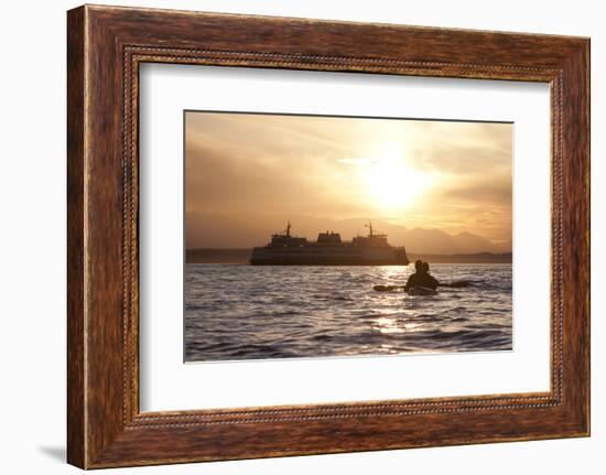 USA, Washington State, Seattle. Two-person sea kayak in Elliott Bay at sunset.-Merrill Images-Framed Photographic Print