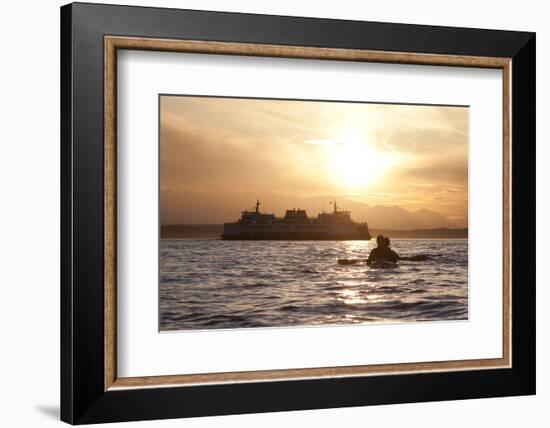 USA, Washington State, Seattle. Two-person sea kayak in Elliott Bay at sunset.-Merrill Images-Framed Photographic Print