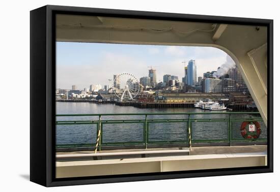 USA, Washington State, Seattle. Waterfront in morning sun framed by ferry structure. Seattle Great -Trish Drury-Framed Premier Image Canvas