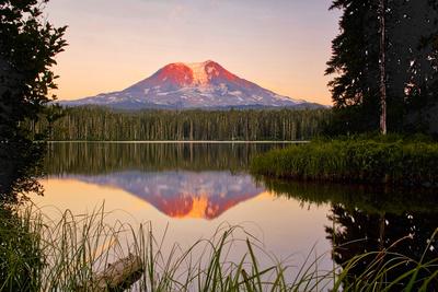 'USA, Washington State, Sunset on Mt. Adams reflecting in Lake Takhlakh ...