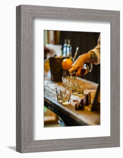 USA, Washington State, Woodinville. Bourbon whiskey pouring at a tasting room.-Richard Duval-Framed Photographic Print