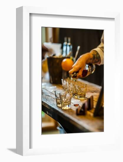 USA, Washington State, Woodinville. Bourbon whiskey pouring at a tasting room.-Richard Duval-Framed Photographic Print