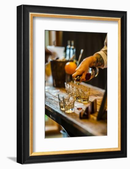 USA, Washington State, Woodinville. Bourbon whiskey pouring at a tasting room.-Richard Duval-Framed Photographic Print