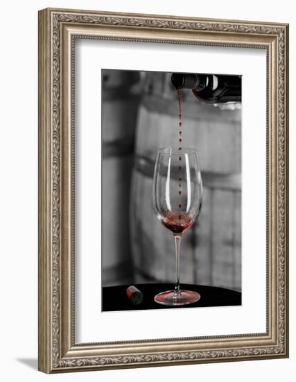 USA, Washington Woodinville. Red wine pouring into is captured in mid-air-Richard Duval-Framed Photographic Print