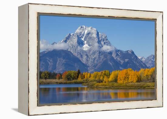 USA, Wyoming. Grand Teton National Park, fresh snowfall covers Mt. Moran on an autumn morning.-Elizabeth Boehm-Framed Premier Image Canvas