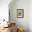 USA, Wyoming, male Yellow-headed Blackbird perches on dried cattails-Elizabeth Boehm-Framed Photographic Print displayed on a wall