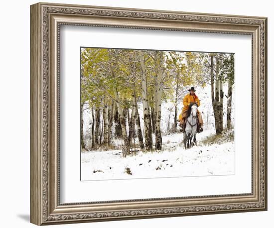 USA, Wyoming, Shell, Big Horn Mountains, Cowboys riding through with fresh snowfall-Terry Eggers-Framed Photographic Print
