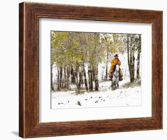 USA, Wyoming, Shell, Big Horn Mountains, Cowboys riding through with fresh snowfall-Terry Eggers-Framed Photographic Print