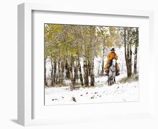 USA, Wyoming, Shell, Big Horn Mountains, Cowboys riding through with fresh snowfall-Terry Eggers-Framed Photographic Print