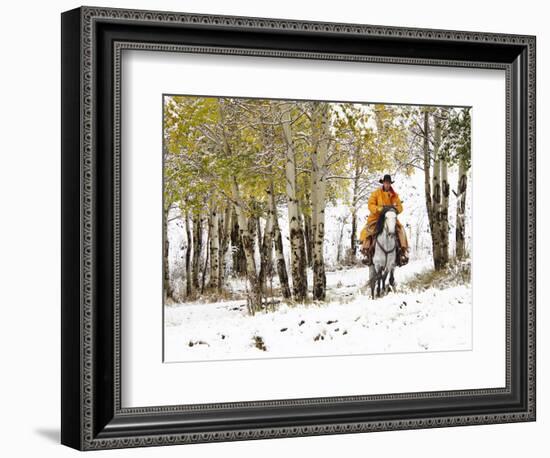 USA, Wyoming, Shell, Big Horn Mountains, Cowboys riding through with fresh snowfall-Terry Eggers-Framed Photographic Print