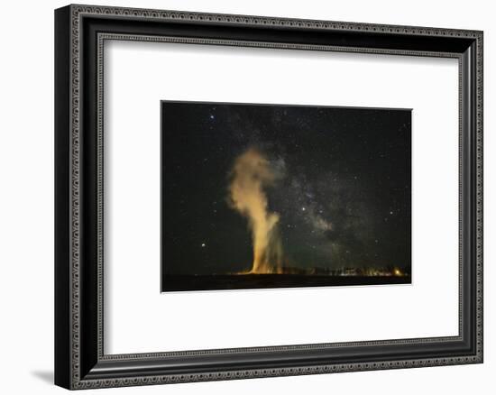 USA, Wyoming, Yellowstone NP. Milky Way and erupting Old Faithful Geyser.-Jaynes Gallery-Framed Photographic Print