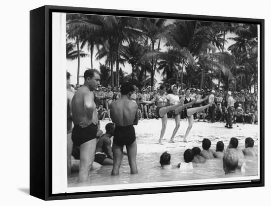 USO Chorus Girls Doing High-Kicks in Swimsuits During Impromptu Song and Dance on Beach-Peter Stackpole-Framed Premier Image Canvas