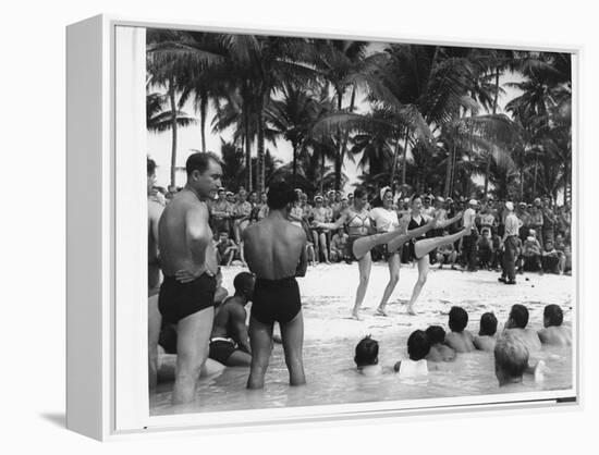 USO Chorus Girls Doing High-Kicks in Swimsuits During Impromptu Song and Dance on Beach-Peter Stackpole-Framed Premier Image Canvas